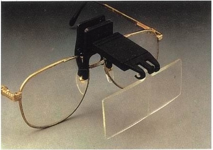 Lupa binocular montada en gafas